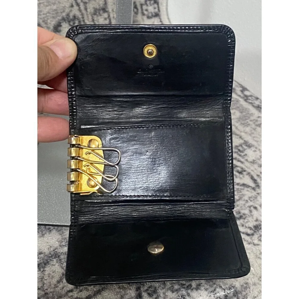 Louis Vuitton Black Epi Leather Key Holder With Gold Hardware And Snap Closure